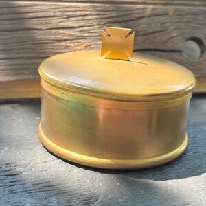 The Host Box with Cross Finial in Gold Color is a unique and religious collectib